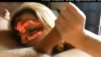 Amateur Masked Milf Sucks Cock