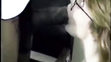 Milf sucking on a monster