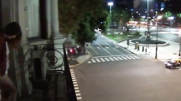 Outdoor public pissing from a balcony in America